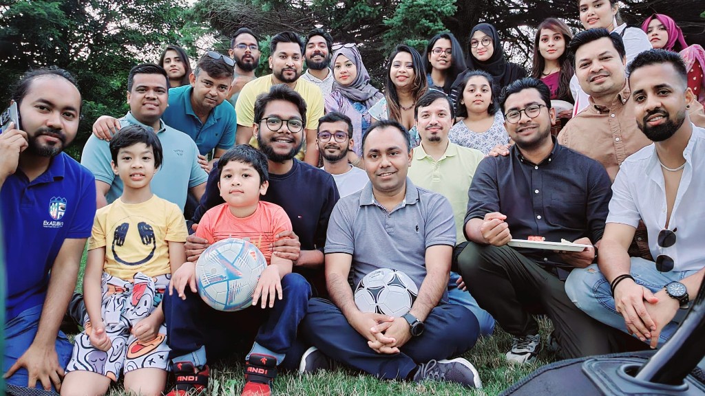 Sakif Ahmed with community members